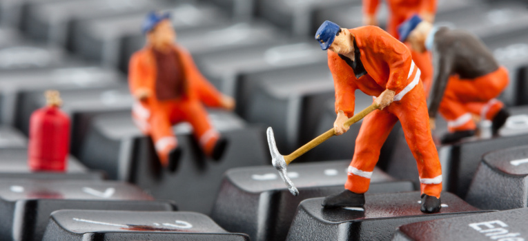 Keyword with models of workers in orange jumpsuit and blue hats